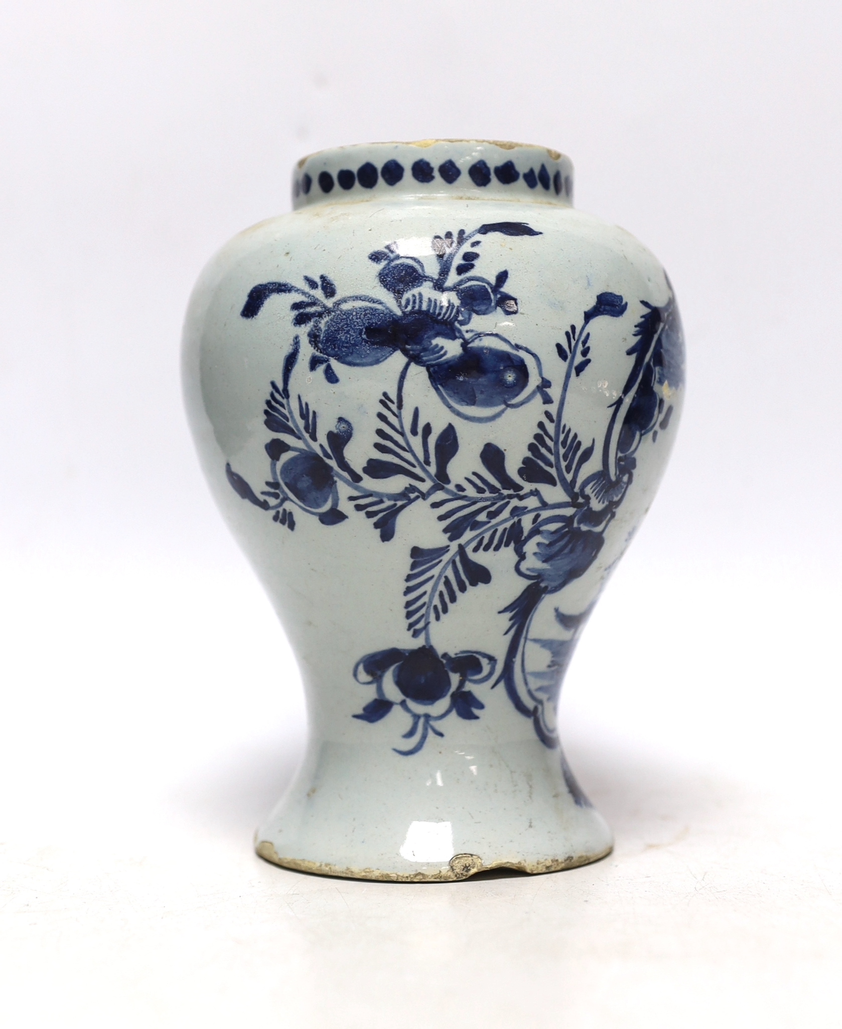 An 18th century Delft blue and white baluster vase, 17cm